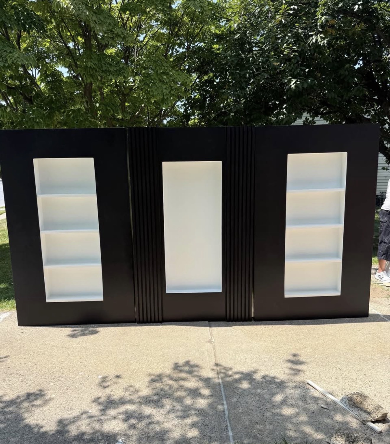 Black event backdrop with recessed shelves